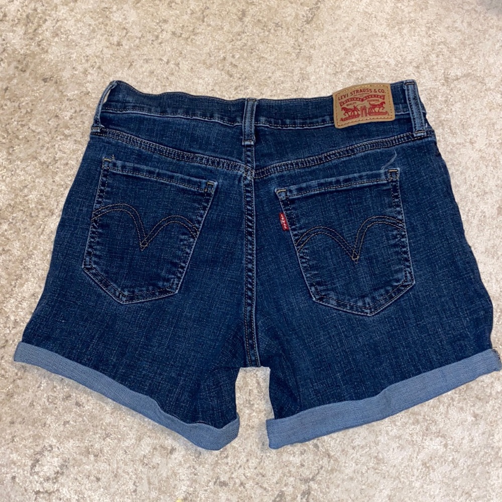 Levi’s mid length Jean shorts dark wash mid rise w 27